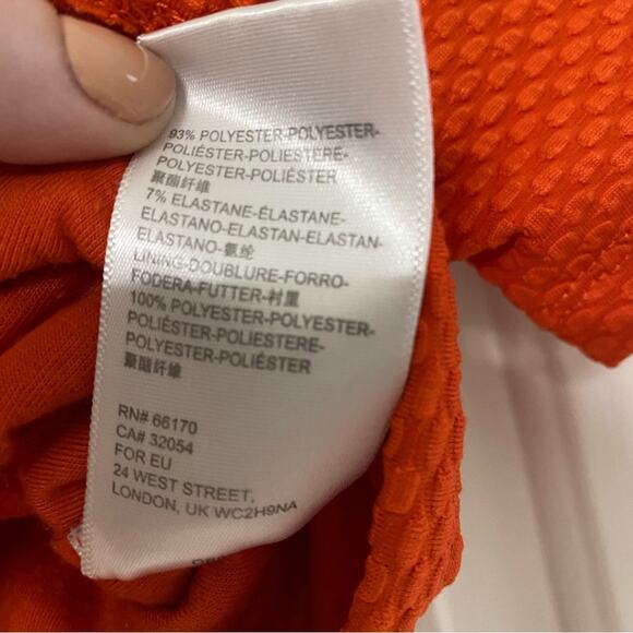 URBAN OUTFITTERS • Orange Textured Open Toe Back Mod Crop Top - Picture 6 of 6